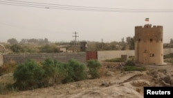 FILE - A watchtower between Afghanistan and Iran is pictured at the Milak border crossing Sistan and Baluchestan Province, Iran, Sept. 8, 2021. (Majid Asgaripour/West Asia News Agency)