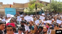 Afghans in Badghis province shout anti-U.S. slogans Aug. 5, 2022, during a demonstration against the recent U.S. drone strike in Kabul that killed al-Qaida chief Ayman al-Zawahiri.