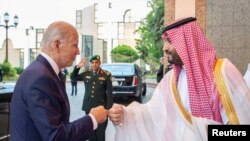 Saudi Crown Prince Mohammed bin Salman fist bumps U.S. President Joe Biden upon his arrival at Al Salman Palace, in Jeddah, Saudi Arabia. (Bandar Algaloud/Courtesy of Saudi Royal Court/Handout via Reuters)