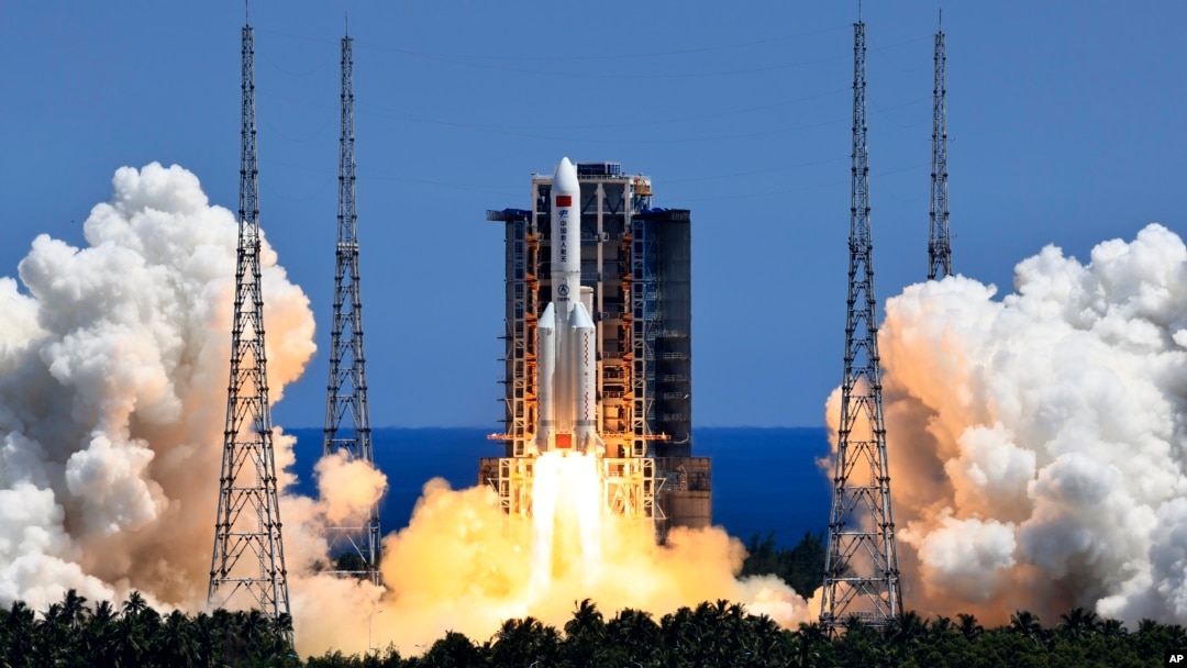 FILE: In this photo released by Xinhua News Agency, the Long March 5B Y3 carrier rocket, carrying Wentian lab module blasts off from the Wenchang Space Launch Center in southern China's Hainan Province, July 24, 2022.