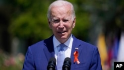President Joe Biden speaks during an event to celebrate the passage of the "Bipartisan Safer Communities Act," a law meant to reduce gun violence, on the South Lawn of the White House, July 11, 2022, in Washington.