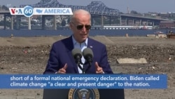 VOA60 America - President Biden calls climate change "a clear and present danger" to the nation