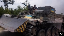 ARHIVA - Ukrajinske snage u Donjecku (Foto: AP/Nariman El-Mofty)
