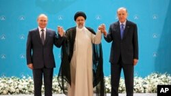 Ruski predsjednik Vladimir Putin, iranski predsjednik Ebrahim Raisi i turski predsjednik Redžep Tajip Erdoan u Teheranu, 19. jula 2022.