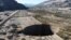 A sinkhole that emerged last week has doubled in size, at a mining zone close to Tierra Amarilla town, in Copiapo, Chile, Aug. 7, 2022.