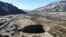 A sinkhole that emerged last week has doubled in size, at a mining zone close to Tierra Amarilla town, in Copiapo, Chile, Aug. 7, 2022.