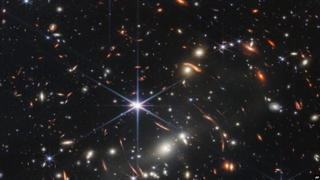 This image provided by NASA on July 11, 2022, shows galaxy cluster SMACS 0723, captured by the James Webb Space Telescope. The telescope is designed to peer back so far that scientists can get a glimpse of the dawn of the universe about 13.7 billion years ago.