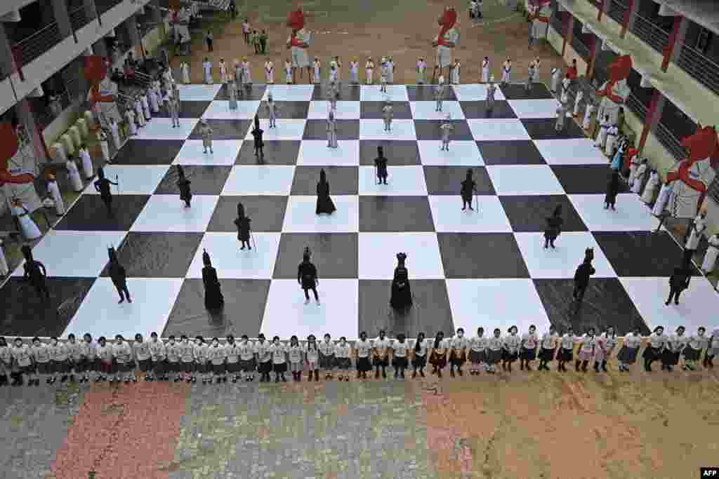 Children dressed as chess pieces perform during an event organized ahead of the 44th Chess Olympiad 2022, in Chennai, India.