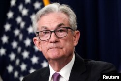 Federal Reserve Board Chairman Jerome Powell attends a news conference, in Washington