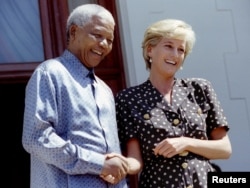 FILE - Diana, Princess of Wales, meets South African President Nelson Mandela in Cape Town, March 17, 1997.