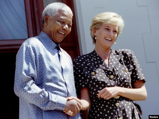 FILE - Diana, Princess of Wales, meets South African President Nelson Mandela in Cape Town, March 17, 1997.