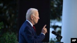 President Joe Biden speaks from the Blue Room Balcony of The White House on 8.1.2022 in Washington, as he announces that a U.S. airstrike killed al-Qaida leader Ayman al-Zawahiri in Afghanistan. 