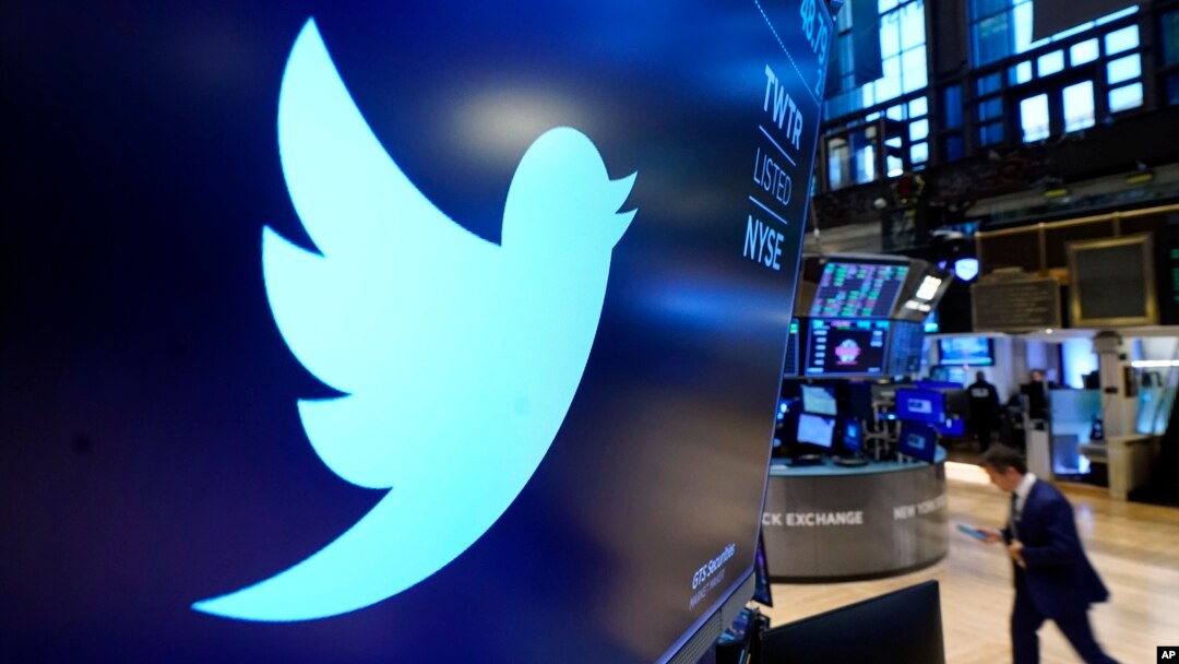 The logo for Twitter appears above a trading post on the floor of the New York Stock Exchange in this Nov. 29, 2021, file photo. 