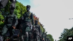 Army soldiers patrol outside the parliament building in Colombo, Sri Lanka, July 16, 2022.