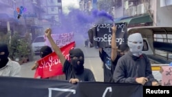 People protest in the wake of executions, in Yangon, Myanmar, July 25, 2022 in this screen grab obtained from a social media video. (Lu Nge Khit/via Reuters) 