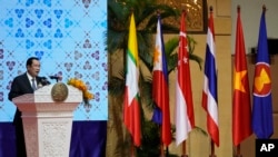 Cambodian Prime Minister Hun Sen delivers the opening speech for the 55th ASEAN Foreign Ministers' Meeting (55th AMM) at a hotel in Phnom Penh, Cambodia, Wednesday, Aug. 3, 2022.