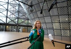 European Commissioner for Energy Kadri Simson speaks with the media as she arrives for an emergency meeting of EU energy ministers in Brussels on Tuesday, July 26, 2022. rationing natural gas this winter to protect against any further supply cuts by Russi