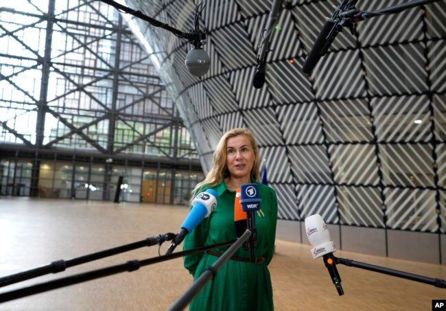 European Commissioner for Energy Kadri Simson speaks with the media as she arrives for an emergency meeting of EU energy ministers in Brussels on Tuesday, July 26, 2022. rationing natural gas this winter to protect against any further supply cuts by Russi