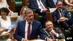 A handout photograph released by the U.K. Parliament shows Britain's leader of the opposition Labour Party Keir Starmer speaking during a debate in the House of Commons in London on July 18, 2022. Starmer is among the British nationals barred from enterin