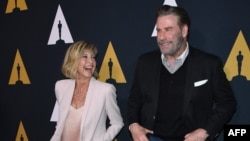 ARHIVA - Olivija Njutn-Džon i Džon Travolta dolaze na proslavu 40. godišnjice filma "Brilijantin" u Holivudu, 15. avgusta 2018.