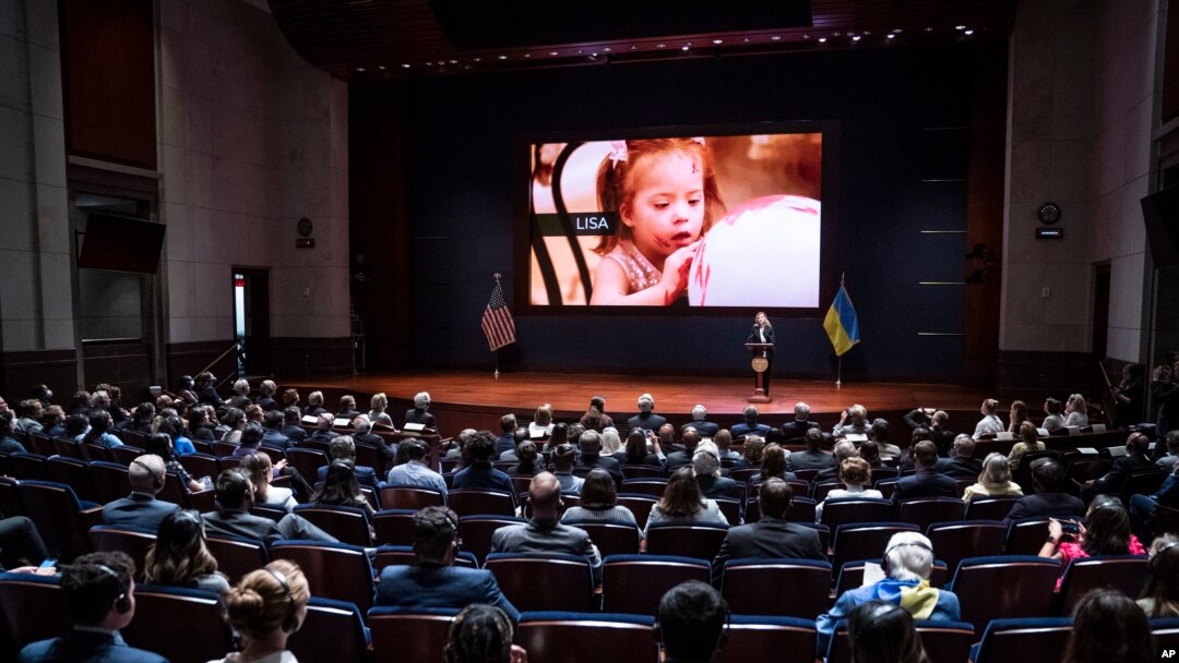 Olena Zelenska, the first lady of Ukraine, introduces members of Congress to a young victim of a Russian bombing during her address on Capitol Hill in Washington, July 20, 2022.