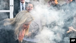 United States Ambassador to Australia Caroline Kennedy participates in an Aboriginal smoking ceremony at the U.S. Embassy in Canberra, Australia, July 25, 2022. Kennedy will be part of a high-profile diplomatic delegation visiting the Solomon Islands next week.