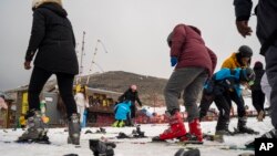 First-time skiers get ready for their first lesson at the Afriski ski resort near Butha-Buthe, Lesotho, July 30, 2022.