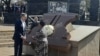 U.S. Secretary of State Antony Blinken, left, speaks with Antoinette Sithole, the sister of the late Hector Pieterson after they laid a wreath at the Hector Pieterson Memorial in Soweto, South Africa, Aug. 7, 2022.