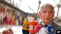 FILE - European Union foreign policy chief Josep Borrell speaks with the media in Brussels on July 18, 2022. 