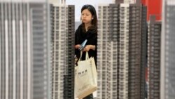 中國多地鼓勵公務員團購買房是添房還是添堵？