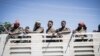 FILE - Members of the Ethiopian National Defense Force are seen on a truck in Shewa Robit, Ethiopia, on Dec. 5, 2021.