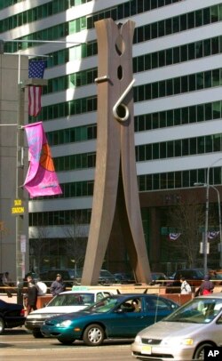 FILE - Pop artist Claes Oldenburg's "Clothespin" sculpture is displayed in the Center City section of Philadelphia, March 1, 2002.