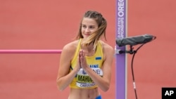 Yaroslava Mahuchikh, of Ukraine, competes during qualifying for the women's high jump at the World Athletics Championships in Eugene, Oregon, July 16, 2022. 