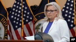 Vice Chair Liz Cheney arrives after a break as the House select committee investigating the Jan. 6 attack on the U.S. Capitol holds a hearing at the Capitol in Washington, July 21, 2022.