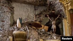 A view of a damaged church in the aftermath of an earthquake in Tayum, Abra province, Philippines.
