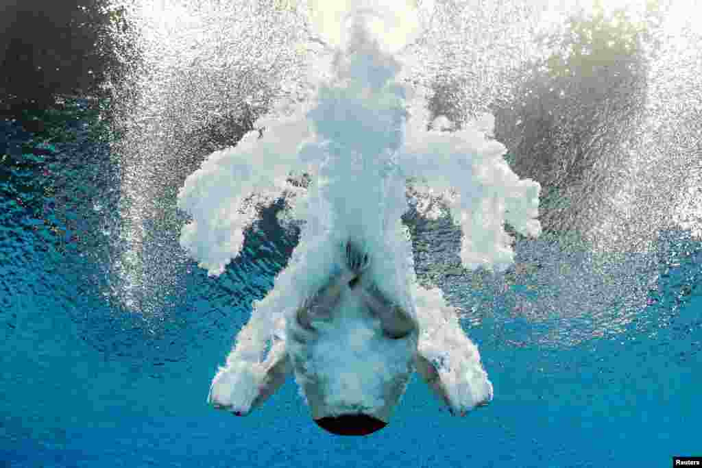 England's Matthew Lee competes in the men's 10m platform preliminary during the Commonwealth Games at the Sandwell Aquatics Center in in Birmingham, England.