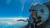 In this photo released by Xinhua News Agency, a Chinese air force pilot conducts a combat training exercises around the Taiwan Island, Aug. 7, 2022.