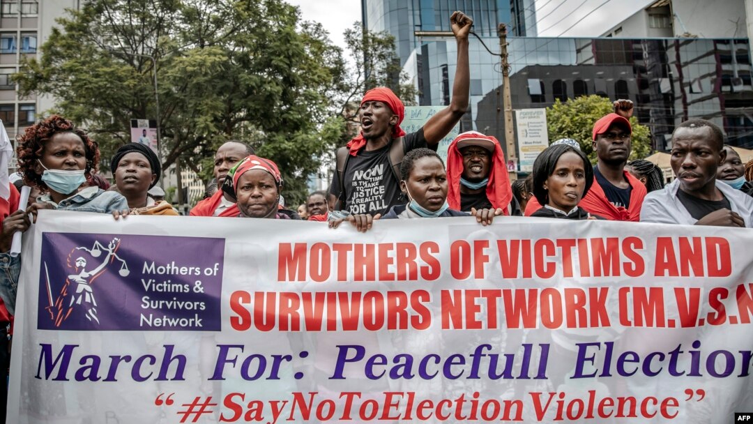 FILE - Protesters chant slogans while marching to demand peaceful elections and justice for victims of post-election violence in Nairobi, Kenya on June 23, 2022. Kenyans head to the polls to vote for president on August 9, 2022