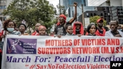 FILE - Protesters chant slogans while marching to demand peaceful elections and justice for victims of post-election violence in Nairobi, Kenya on June 23, 2022. Kenyans head to the polls to vote for president on August 9, 2022