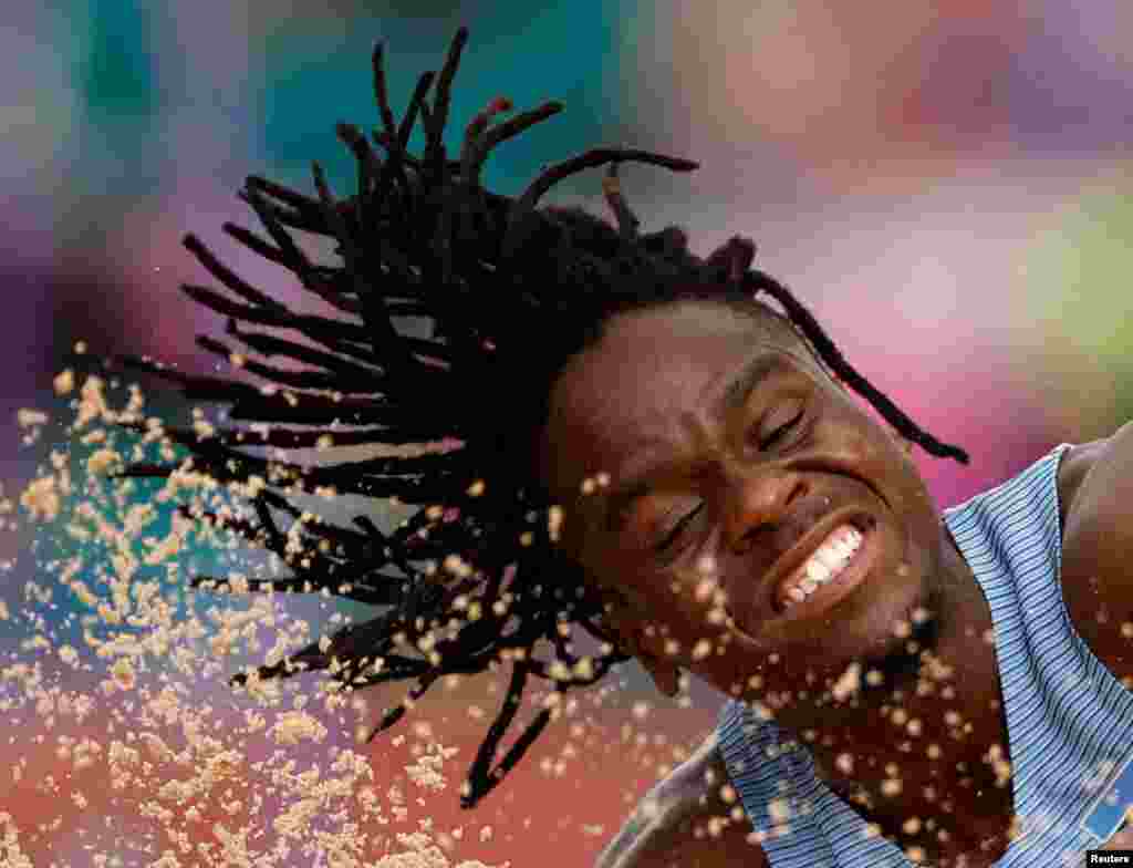 Botswana&#39;s Thapelo Monaiwa competes in the men&#39;s long jump qualifying round during the Commonwealth Games at the Alexander Stadium in Birmingham, Britain.