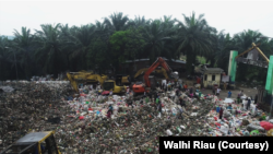 ILUSTRASI- Pengelolaan sampah kota Pekanbaru yang bermasalah mendorong warga menggugat pemerintah setempat, dan menang. (Foto: Walhi Riau)