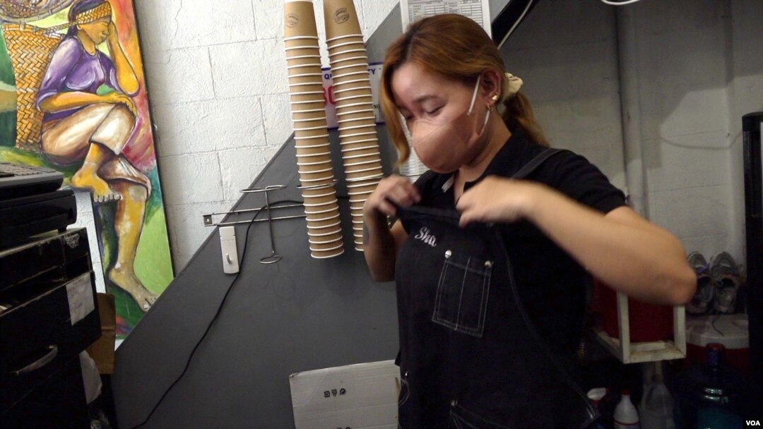 Sharon Angeles, head barista at Silingan coffee shop near Manila, lost her 20-year-old brother, Christian, in 2016. Angeles says Christian was not involved with drugs but was killed because he was at the wrong place at the wrong time. (Dave Grunebaum/VOA)