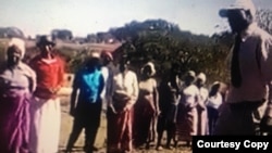 An unidentified Zanu PF official addressing villagers where he told them to take slogans seriously 