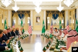 President Joe Biden participates in a working session with Saudi Crown Prince Mohammed bin Salman at the Al Salman Royal Palace, July 15, 2022, in Jeddah.
