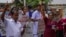 Government hospital staff members shout anti-government slogans condemning the eviction of protesters from the president's office using military force in Colombo, Sri Lanka, July 23, 2022.