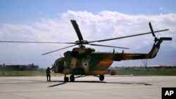 FILE – This May 13, 2013, file photo shows the type of helicopter – an Mi-17 –used by the Afghan Air Force in Afghanistan. The Philippine government has scrapped a deal to purchase 16 Mi-17 helicopters from Russia due to fears of possible U.S. sanctions.