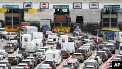 Car queue at the check-in at Dover Port as many families embark on getaways at the start of summer holidays for many schools in England and Wales, in Kent, England, July 22, 2022.