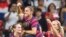 Alex Morgan, en haut, célèbre son but avec ses coéquipiers après avoir marqué contre le Canada, à Monterrey, Mexique, le 18 juillet 2022.