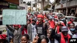 FILE: Protesters chant slogans while marching during a protest to demand peaceful elections and justice for victims of post-election violence in Nairobi. Taken 6.23.2022