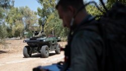 Israel Aerospace Industries' semi-autonomous four-wheel-drive "REX MKII" is seen at an IAI facility near the central Israeli city of Lod, Thursday, Sept. 9, 2021.(AP Photo/Sebastian Scheiner)